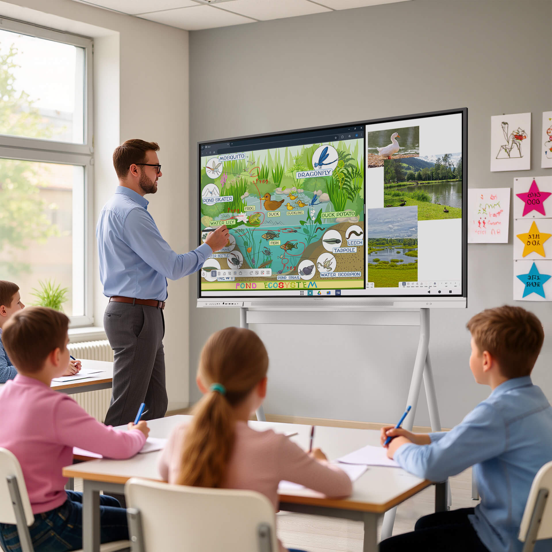 interactive smart board used in classroom teaching with students engaged in lesson - Nework